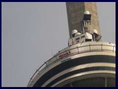 CN Tower 23 - the people in red are hoovering in the air at EdgeWalk